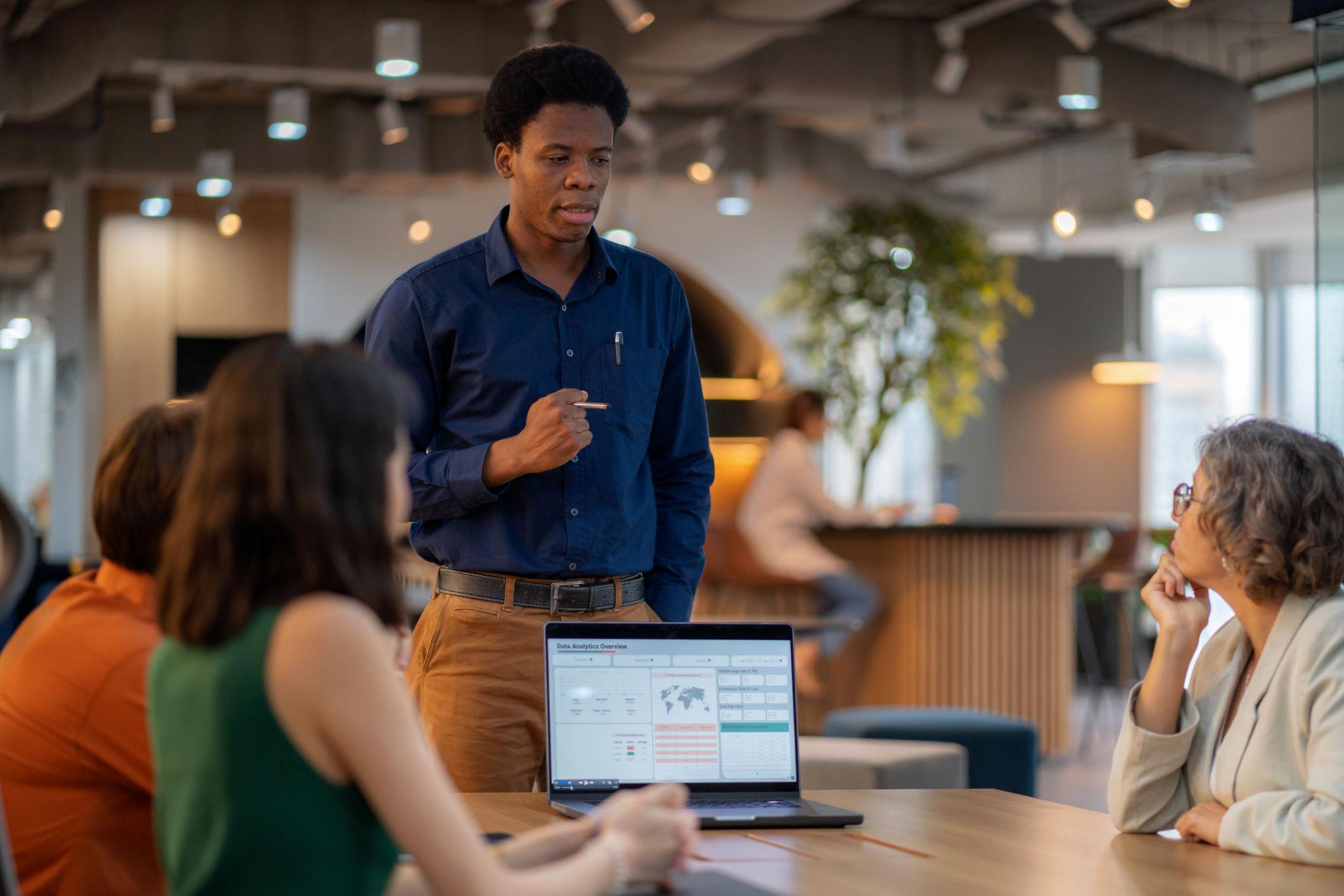 Consultant walking a client team through a business strategy